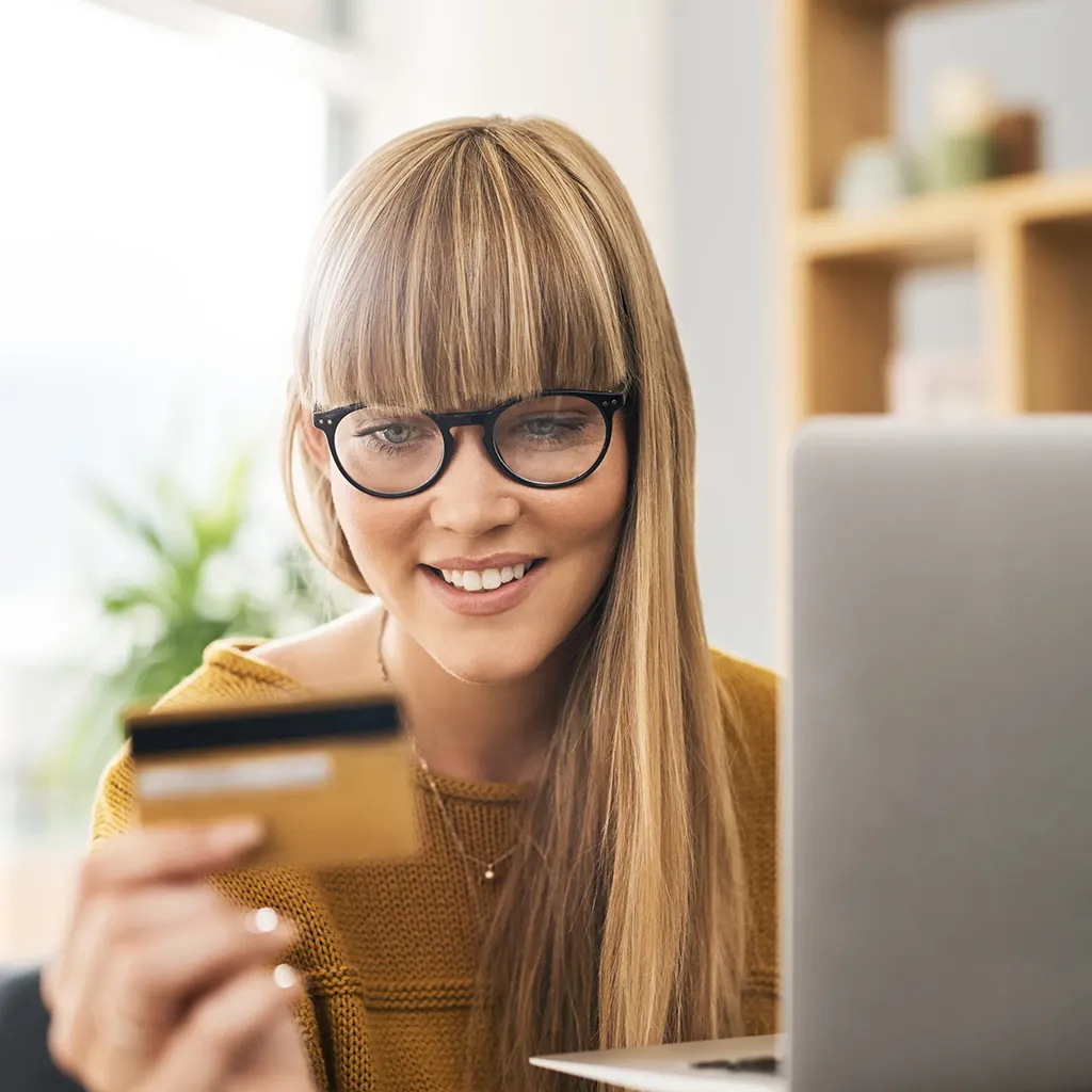Woman at laptop making payment