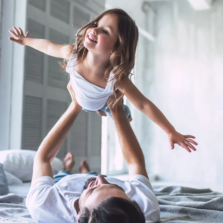 Parent and child playing